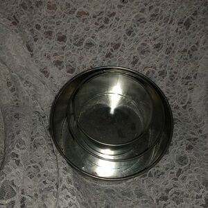 A set of three fruitcake/ wedding cake baking pans. Non removable bottoms